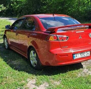 Червоний Міцубісі Lancer, об'ємом двигуна 2 л та пробігом 197 тис. км за 7300 $, фото 2 на Automoto.ua