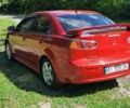 Червоний Міцубісі Lancer, об'ємом двигуна 2 л та пробігом 197 тис. км за 7300 $, фото 2 на Automoto.ua