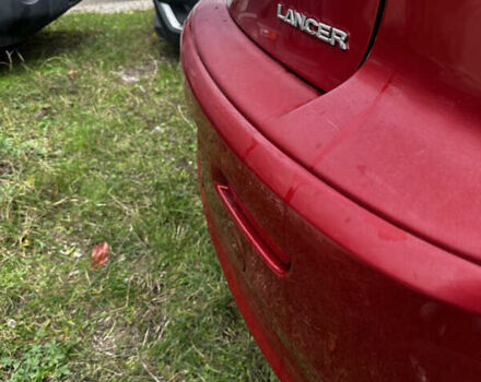 Красный Мицубиси Лансер, объемом двигателя 2 л и пробегом 92 тыс. км за 6500 $, фото 5 на Automoto.ua