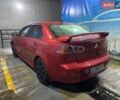 Червоний Міцубісі Lancer, об'ємом двигуна 2 л та пробігом 127 тис. км за 7500 $, фото 1 на Automoto.ua