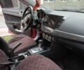 Червоний Міцубісі Lancer, об'ємом двигуна 2 л та пробігом 2 тис. км за 6200 $, фото 12 на Automoto.ua