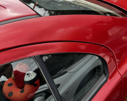 Красный Мицубиси Лансер, объемом двигателя 2 л и пробегом 92 тыс. км за 6500 $, фото 8 на Automoto.ua