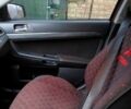 Червоний Міцубісі Lancer, об'ємом двигуна 2 л та пробігом 228 тис. км за 6500 $, фото 1 на Automoto.ua