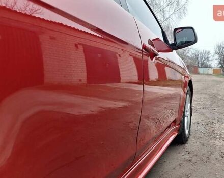 Красный Мицубиси Лансер, объемом двигателя 2 л и пробегом 120 тыс. км за 7800 $, фото 17 на Automoto.ua