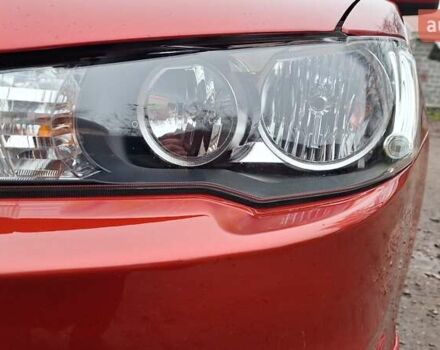 Красный Мицубиси Лансер, объемом двигателя 2 л и пробегом 120 тыс. км за 7800 $, фото 9 на Automoto.ua
