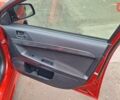 Красный Мицубиси Лансер, объемом двигателя 2 л и пробегом 120 тыс. км за 7800 $, фото 31 на Automoto.ua