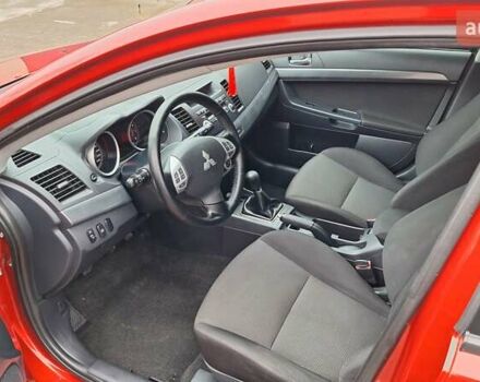 Красный Мицубиси Лансер, объемом двигателя 2 л и пробегом 120 тыс. км за 7800 $, фото 23 на Automoto.ua