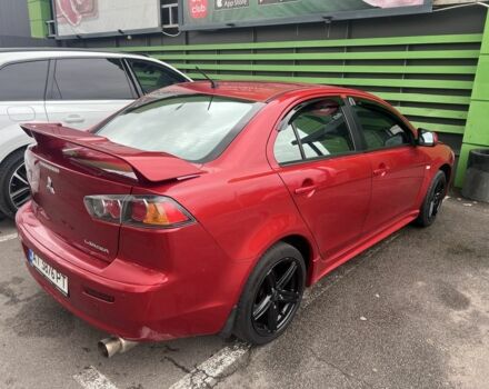 Червоний Міцубісі Lancer, об'ємом двигуна 2 л та пробігом 240 тис. км за 4900 $, фото 2 на Automoto.ua