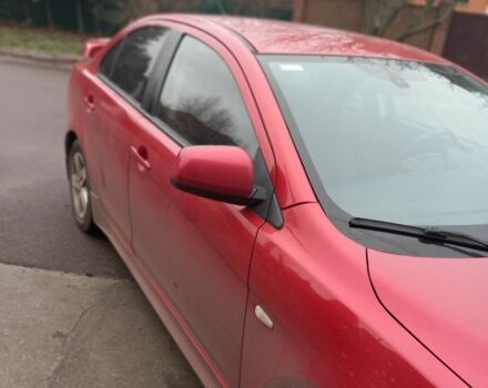 Червоний Міцубісі Lancer, об'ємом двигуна 2 л та пробігом 250 тис. км за 6500 $, фото 1 на Automoto.ua
