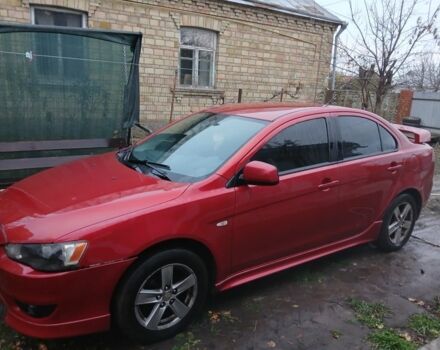 Червоний Міцубісі Lancer, об'ємом двигуна 2 л та пробігом 2 тис. км за 6200 $, фото 10 на Automoto.ua