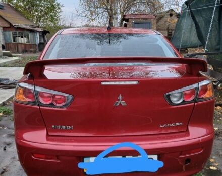 Червоний Міцубісі Lancer, об'ємом двигуна 2 л та пробігом 2 тис. км за 6200 $, фото 9 на Automoto.ua