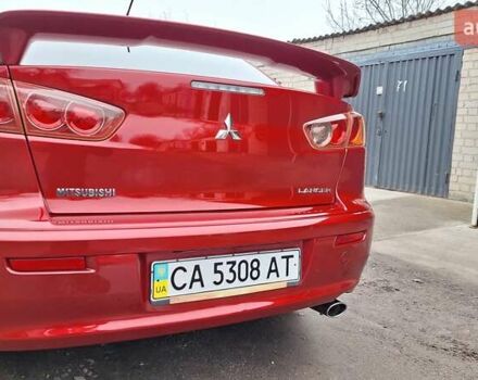 Красный Мицубиси Лансер, объемом двигателя 2 л и пробегом 120 тыс. км за 7800 $, фото 11 на Automoto.ua