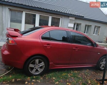 Червоний Міцубісі Lancer, об'ємом двигуна 2 л та пробігом 228 тис. км за 6200 $, фото 4 на Automoto.ua