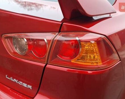 Красный Мицубиси Лансер, объемом двигателя 2 л и пробегом 120 тыс. км за 7800 $, фото 13 на Automoto.ua