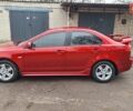 Красный Мицубиси Лансер, объемом двигателя 2 л и пробегом 120 тыс. км за 7800 $, фото 1 на Automoto.ua