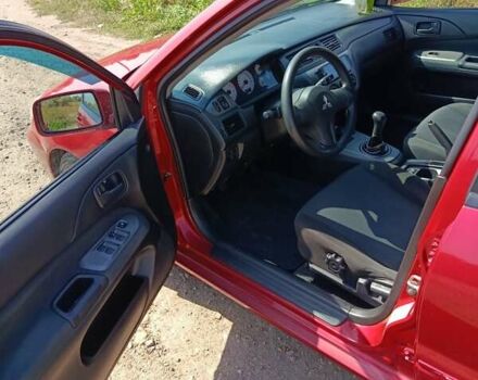 Червоний Міцубісі Lancer, об'ємом двигуна 1.6 л та пробігом 246 тис. км за 5500 $, фото 3 на Automoto.ua