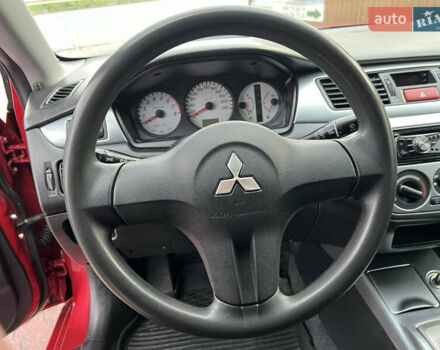 Міцубісі Lancer 2009 у Вінниці на Automoto.ua Червоний Міцубісі Lancer, об'ємом двигуна 1.58 л та пробігом 133 тис. км за 6750 $, фото 35 на Automoto.ua