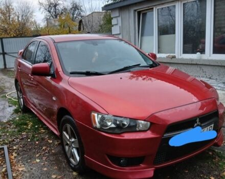 Червоний Міцубісі Lancer, об'ємом двигуна 2 л та пробігом 2 тис. км за 6200 $, фото 3 на Automoto.ua