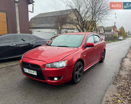 Красный Мицубиси Лансер, объемом двигателя 2 л и пробегом 246 тыс. км за 4900 $, фото 1 на Automoto.ua