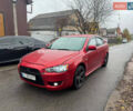Красный Мицубиси Лансер, объемом двигателя 2 л и пробегом 246 тыс. км за 4900 $, фото 1 на Automoto.ua