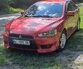 Червоний Міцубісі Lancer, об'ємом двигуна 2 л та пробігом 197 тис. км за 7300 $, фото 1 на Automoto.ua