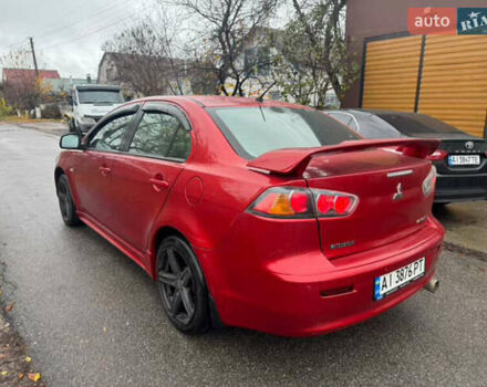 Красный Мицубиси Лансер, объемом двигателя 2 л и пробегом 246 тыс. км за 4900 $, фото 2 на Automoto.ua