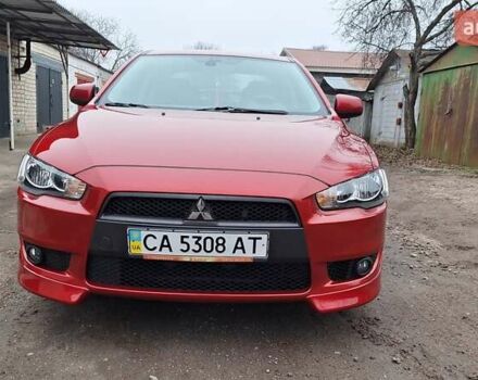 Красный Мицубиси Лансер, объемом двигателя 2 л и пробегом 120 тыс. км за 7800 $, фото 7 на Automoto.ua