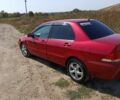 Червоний Міцубісі Lancer, об'ємом двигуна 1.6 л та пробігом 246 тис. км за 5500 $, фото 12 на Automoto.ua