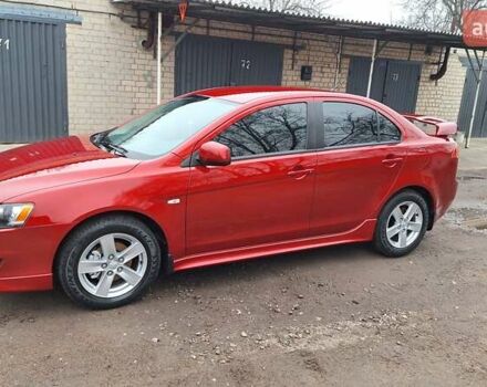 Красный Мицубиси Лансер, объемом двигателя 2 л и пробегом 120 тыс. км за 7800 $, фото 22 на Automoto.ua