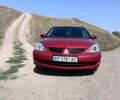 Червоний Міцубісі Lancer, об'ємом двигуна 1.6 л та пробігом 246 тис. км за 5500 $, фото 1 на Automoto.ua