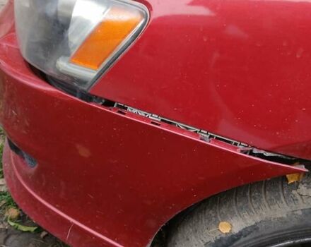Червоний Міцубісі Lancer, об'ємом двигуна 2 л та пробігом 228 тис. км за 6200 $, фото 10 на Automoto.ua