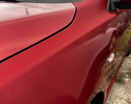 Красный Мицубиси Лансер, объемом двигателя 2 л и пробегом 92 тыс. км за 6500 $, фото 6 на Automoto.ua