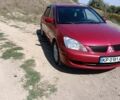 Червоний Міцубісі Lancer, об'ємом двигуна 1.6 л та пробігом 246 тис. км за 5500 $, фото 9 на Automoto.ua