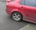 Червоний Міцубісі Lancer, об'ємом двигуна 2 л та пробігом 250 тис. км за 6500 $, фото 1 на Automoto.ua