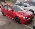 Червоний Міцубісі Lancer, об'ємом двигуна 2 л та пробігом 240 тис. км за 4900 $, фото 1 на Automoto.ua