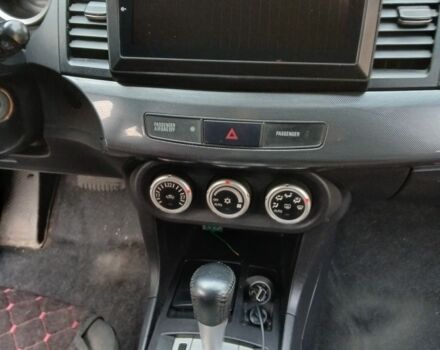 Червоний Міцубісі Lancer, об'ємом двигуна 2 л та пробігом 2 тис. км за 6200 $, фото 13 на Automoto.ua