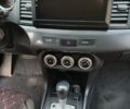 Червоний Міцубісі Lancer, об'ємом двигуна 2 л та пробігом 2 тис. км за 6200 $, фото 13 на Automoto.ua