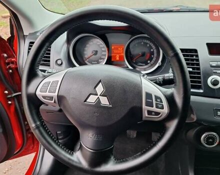 Красный Мицубиси Лансер, объемом двигателя 2 л и пробегом 120 тыс. км за 7800 $, фото 25 на Automoto.ua