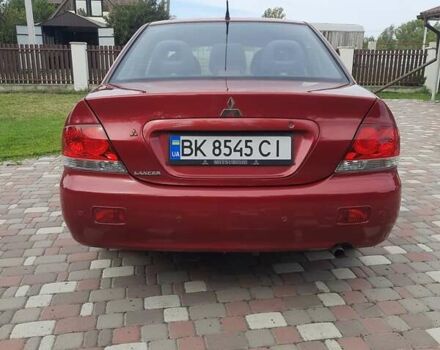 Красный Мицубиси Лансер, объемом двигателя 1.6 л и пробегом 127 тыс. км за 4700 $, фото 3 на Automoto.ua