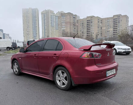 Красный Мицубиси Лансер, объемом двигателя 2 л и пробегом 170 тыс. км за 6300 $, фото 1 на Automoto.ua