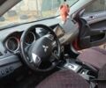 Червоний Міцубісі Lancer, об'ємом двигуна 2 л та пробігом 228 тис. км за 6200 $, фото 13 на Automoto.ua