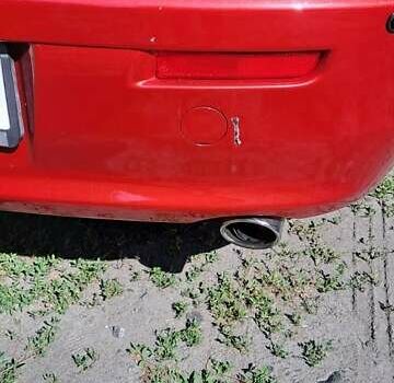 Червоний Міцубісі Lancer, об'ємом двигуна 2 л та пробігом 197 тис. км за 7300 $, фото 10 на Automoto.ua