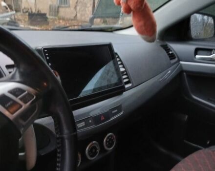 Червоний Міцубісі Lancer, об'ємом двигуна 2 л та пробігом 2 тис. км за 6200 $, фото 4 на Automoto.ua