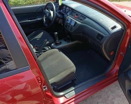 Червоний Міцубісі Lancer, об'ємом двигуна 1.6 л та пробігом 246 тис. км за 5500 $, фото 18 на Automoto.ua