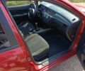 Червоний Міцубісі Lancer, об'ємом двигуна 1.6 л та пробігом 246 тис. км за 5500 $, фото 18 на Automoto.ua