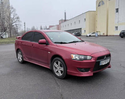 Красный Мицубиси Лансер, объемом двигателя 2 л и пробегом 170 тыс. км за 6300 $, фото 3 на Automoto.ua