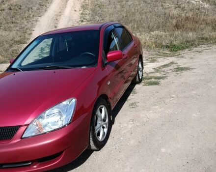 Червоний Міцубісі Lancer, об'ємом двигуна 1.6 л та пробігом 246 тис. км за 5500 $, фото 2 на Automoto.ua