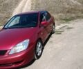 Червоний Міцубісі Lancer, об'ємом двигуна 1.6 л та пробігом 246 тис. км за 5500 $, фото 2 на Automoto.ua