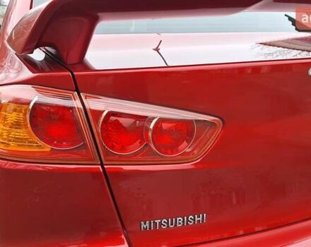 Красный Мицубиси Лансер, объемом двигателя 2 л и пробегом 120 тыс. км за 7800 $, фото 12 на Automoto.ua