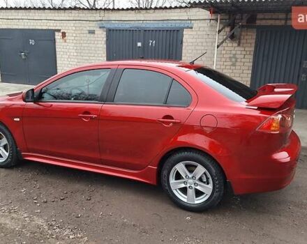 Красный Мицубиси Лансер, объемом двигателя 2 л и пробегом 120 тыс. км за 7800 $, фото 21 на Automoto.ua